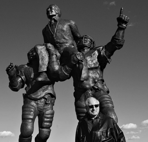 Famed UGA football coach, Vince Dooley, in front of statue celebrating 1980′s National Championship. Photo by Andrew Davis Tucker.